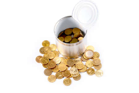 Russian metal coins of gold color in a glass jar as an element of savings and avoid updating of the...