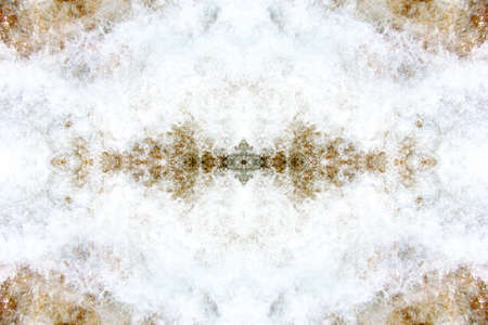 Symmetrical multicolored patterns on the surface of a cut of semi-precious stone
