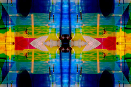 Symmetrical colorful fancy patterns obtained from photographing wildlife through mirrorsの写真素材