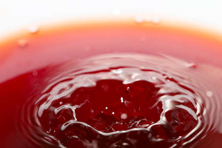 Beautiful patterns on the surface of the liquid after a dropの写真素材