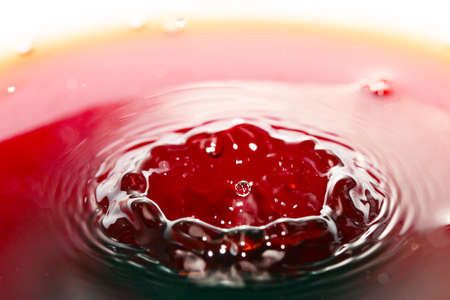 Beautiful patterns on the surface of the liquid after a dropの写真素材