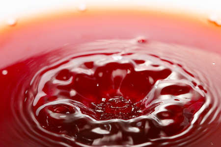 Beautiful patterns on the surface of the liquid after a dropの写真素材