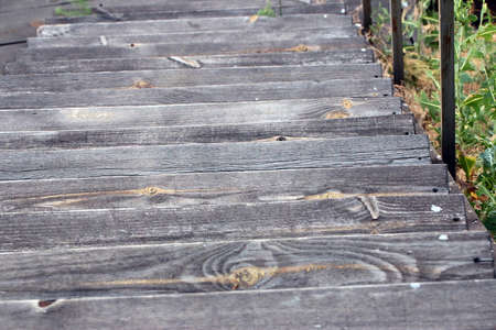Beautiful texture of old wooden stair stepsの写真素材