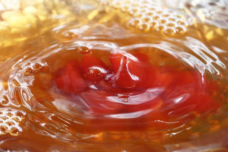 Drops of water when falling on the surface and patternsの写真素材