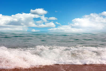 Beautiful sandy beach and transparent waves of the Mediterranean Seaの写真素材