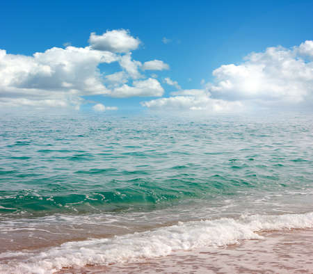 Beautiful sandy beach and transparent waves of the Mediterranean Seaの写真素材