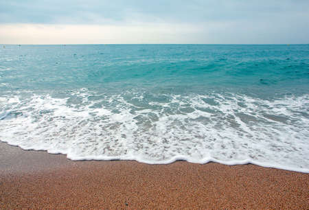 beautiful sandy beach of the Mediterranean sea Catalunya Spainの写真素材