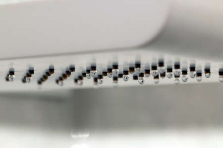 drops of clean water from the nozzleの写真素材