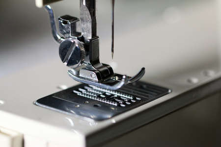 needle in the knot of an industrial sewing machineの写真素材