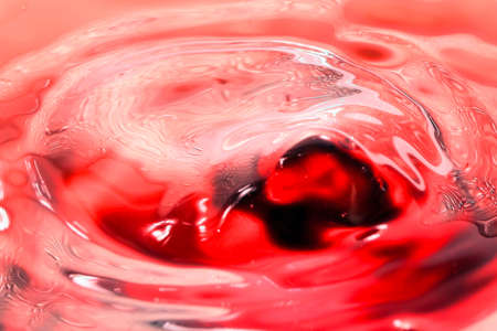 surprisingly diverse traces from the impact of a drop on the surface of a liquidの写真素材