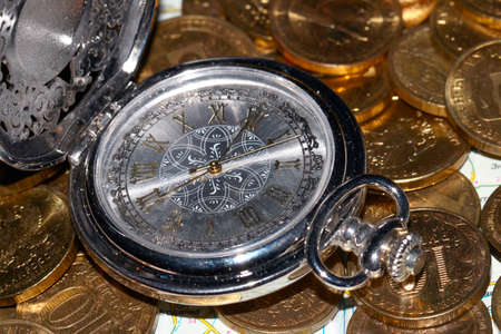 pocket watch in Russian gold coinsの写真素材