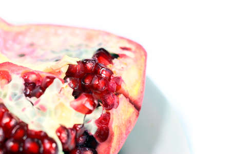 Pieces of ripe fresh tropical garnet fruitの写真素材