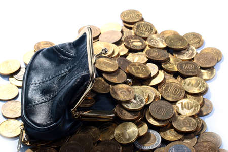 a pile of metallic gold color of Russian coins in a leather purseの写真素材