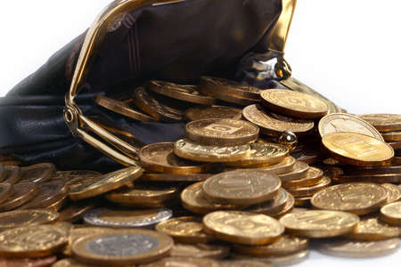 a pile of metallic gold color of Russian coins in a leather purseの写真素材