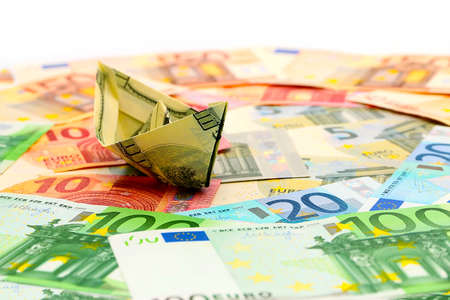 a boat hundred dollars against the background of the euroの写真素材