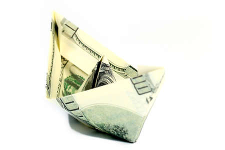 a boat built of American hundred-dollar bills, origamiの写真素材