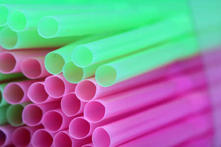 packing of multi-colored plastic tubes for cocktails and drinksの写真素材