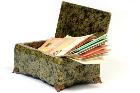 a pile of paper a bile in a box of precious stone malachiteの写真素材