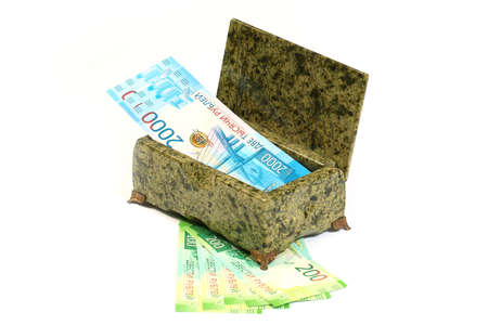 Russian paper banknotes in the box of semiprecious stone malachiteの写真素材