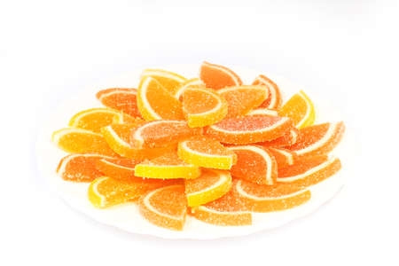 beautiful pieces of fresh marmalade lie on a glass plateの写真素材