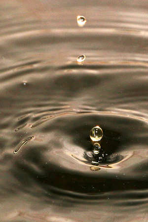 bizarre patterns on the surface of oilの写真素材