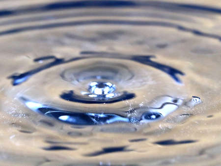 Drops and splashes on the surface of a barrel of oil
