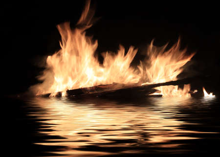 fire of burning shipwreck debrisの写真素材