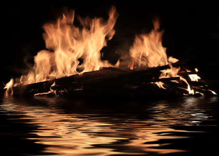 fire of burning shipwreck debrisの写真素材
