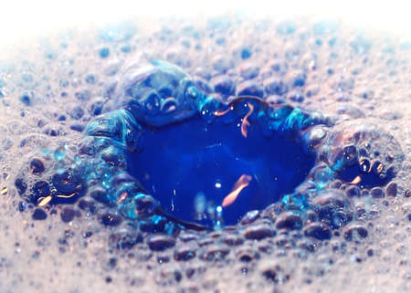 Foam bubbles on the liquidの写真素材