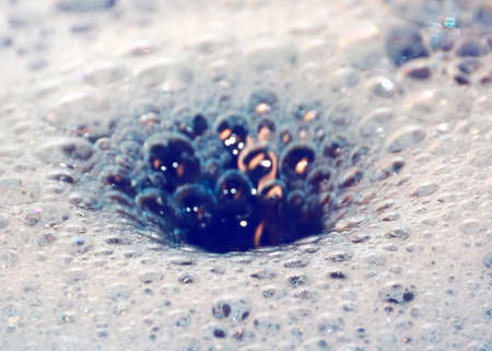 Drop of colored liquidの写真素材