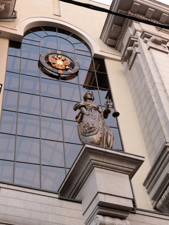 statue of the ancient Greek goddess of justice Themis on the facade of the building of the Supreme Court of the Russian Federationの写真素材