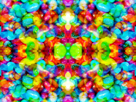 abstract symmetrical pattern created when shooting through kaleidoscope mirrorsの写真素材