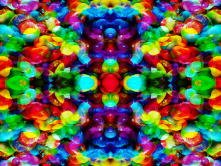 abstract symmetrical pattern created when shooting through kaleidoscope mirrorsの写真素材