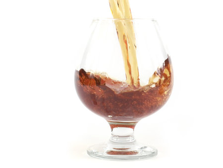 a wonderful stream of strong alcoholic drink when poured into a glass