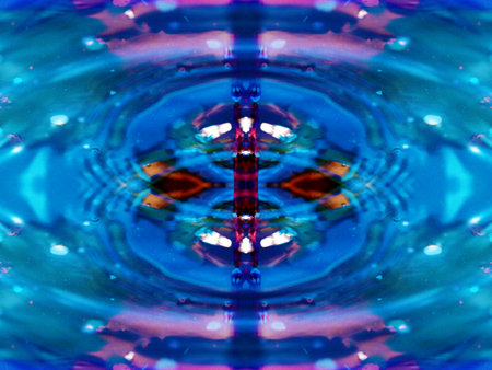 abstract symmetrical pattern created when shooting through kaleidoscope mirrors
