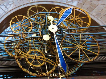 an open wall clock mechanism in the Children's World of Moscow