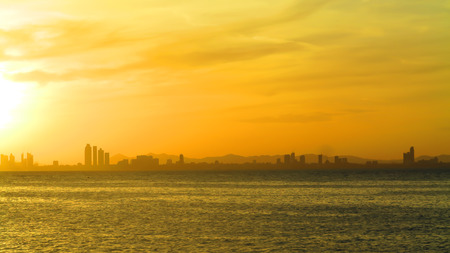 View of city and Sea at sunset.の写真素材