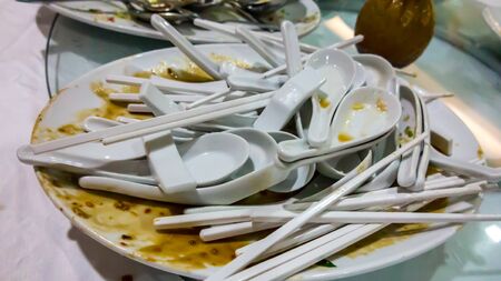 Dirty and empty (breakfast) dishes.の写真素材