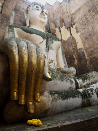 Hand of ancient Buddha statue,Sukothai,Yhailand.の写真素材