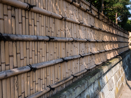 Bamboo fence around the house of Japanese style.の写真素材