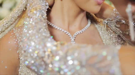 Close-up of a beautiful young woman in a wedding dress.の写真素材