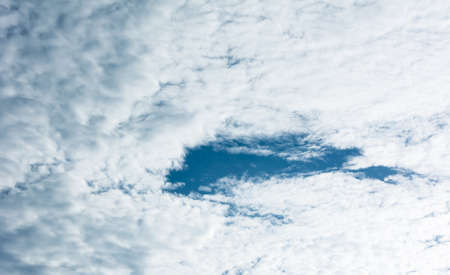 Panoramic view of blue sky, bright cloudy day.の写真素材