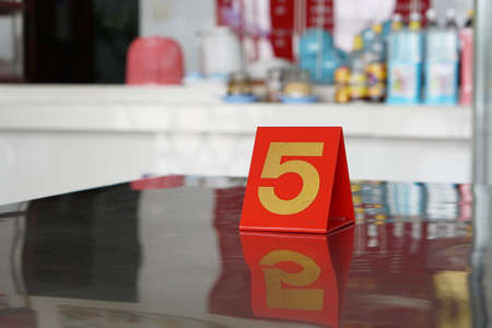5 small marks on the restaurant table In order to sit and eat at a distance from the 19th centuryの写真素材