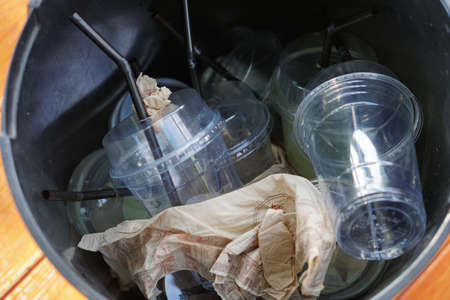The coffee mugs that humans have finished eating are then left in the trash.