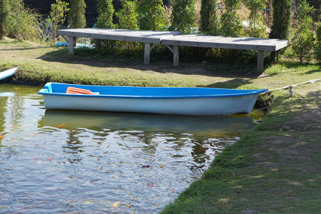 Boats in the park poolの写真素材