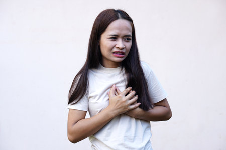 Asian women have chest tightness.の写真素材