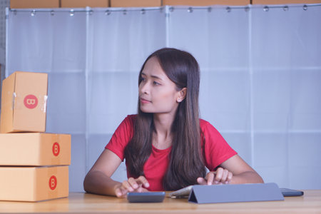 Online merchants view purchase orders via computer. to deliver products to customers