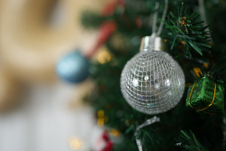Merry Christmas 2024 concept Christmas balls are used to decorate the Christmas tree at family parties.の写真素材