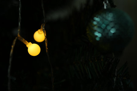 Merry Christmas 2024 concept Christmas balls are used to decorate the Christmas tree at family parties.の写真素材