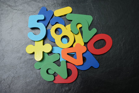 Multicolored numbers on a black backgroundの写真素材